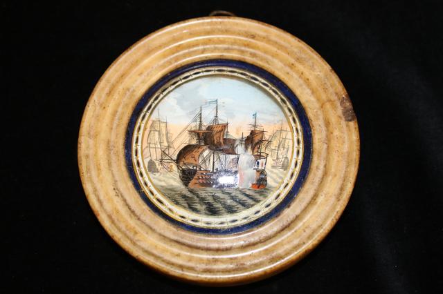 Circular glass plaque decorated with masonic symbolism