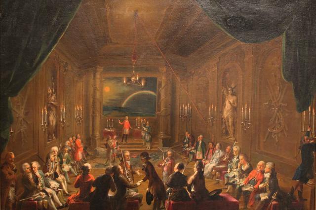 Believed to be Mozart depicted at extreme right, sitting next to his friend Emanuel Schikaneder during a meeting of Loge Zur Neugekrönten Hoffnung, Vienna. Painting by Ignaz Unterberger, 1789. Courtesy: Vienna Museum at Karlsplatz.