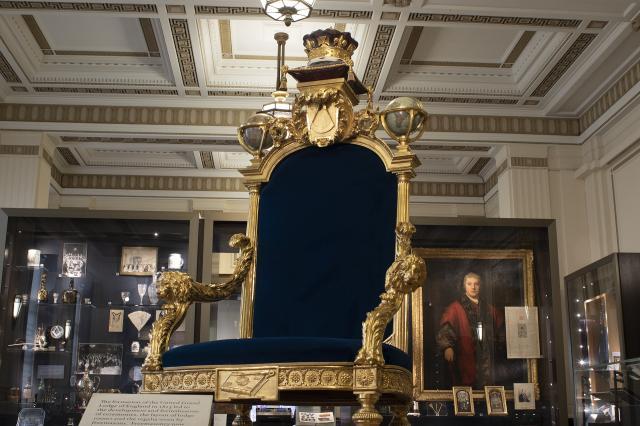 Gold-leafed Grand Master's throne with blue cushions