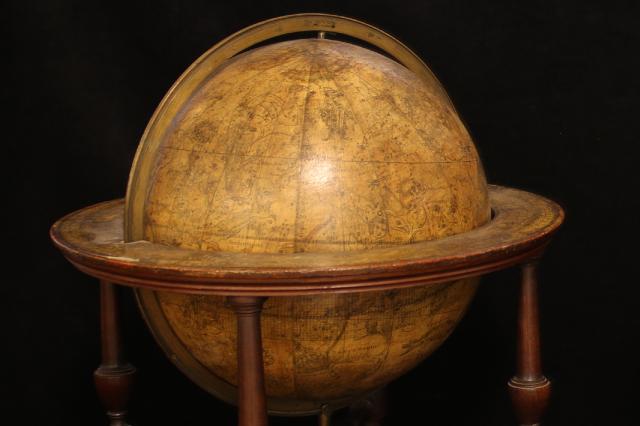 Image of papier mache globe on mahogany stand