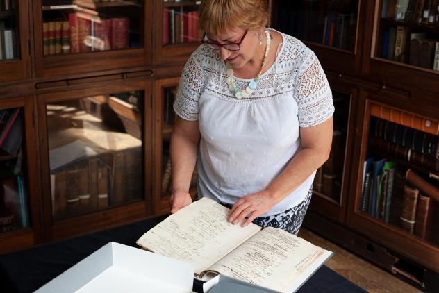 Archivist Susan Snell with William Perfect Manuscript, 2019 ©Museum of Freemasonry